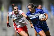 3 August 2025; Mo Nerney of Laois in action against Eimear Quinn of Tyrone during the TG4 All-Ireland Ladies Football Intermediate Championship final match between Laois and Tyrone at Croke Park in Dublin. Photo by Shauna Clinton/Sportsfile