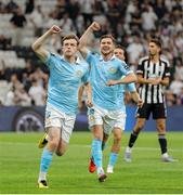 14 August 2025; Conor Carty of St Patrick's Athletic, left, celebrates after scoring his side's first goal during the UEFA Conference League Third Qualifying Round second leg match between Besiktas and St Patrick's Athletic at Besiktas Stadium in Istanbul, Türkiye. Photo by Emre Oktay/Sportsfile