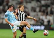 14 August 2025; Kian Leavy of St Patrick's Athletic in action against Jonas Svensson of Besiktas during the UEFA Conference League Third Qualifying Round second leg match between Besiktas and St Patrick's Athletic at Besiktas Stadium in Istanbul, Türkiye. Photo by Emre Oktay/Sportsfile