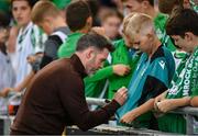 14 August 2025; Shamrock Rovers manager Stephen Bradley with a young supporter before the UEFA Conference League Third Qualifying Round second leg match between Shamrock Rovers and Ballkani at Tallaght Stadium in Dublin. Photo by Stephen McCarthy/Sportsfile