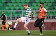14 August 2025; Rory Gaffney of Shamrock Rovers shoots on goal despite the efforts of Bajram Jashanica of Ballkani during the UEFA Conference League Third Qualifying Round second leg match between Shamrock Rovers and Ballkani at Tallaght Stadium in Dublin. Photo by Stephen McCarthy/Sportsfile
