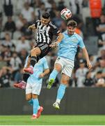 14 August 2025; Darren Robinson of St Patrick's Athletic in action against Milot Rashica of Besiktas during the UEFA Conference League Third Qualifying Round second leg match between Besiktas and St Patrick's Athletic at Besiktas Stadium in Istanbul, Türkiye. Photo by Emre Oktay/Sportsfile