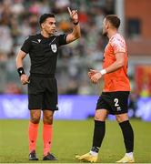 14 August 2025; Referee Mohammad Al-Emara speaks with Geralb Smajli of Ballkani during the UEFA Conference League Third Qualifying Round second leg match between Shamrock Rovers and Ballkani at Tallaght Stadium in Dublin. Photo by Stephen McCarthy/Sportsfile