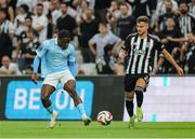 14 August 2025; Al-Amin Kazeem of St Patrick's Athletic in action against Ernest Muçi of Besiktas during the UEFA Conference League Third Qualifying Round second leg match between Besiktas and St Patrick's Athletic at Besiktas Stadium in Istanbul, Türkiye. Photo by Emre Oktay/Sportsfile