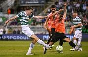 14 August 2025; Matt Healy of Shamrock Rovers shoots on goal despite the efforts of Elvis Letaj of Ballkani during the UEFA Conference League Third Qualifying Round second leg match between Shamrock Rovers and Ballkani at Tallaght Stadium in Dublin. Photo by Ben McShane/Sportsfile