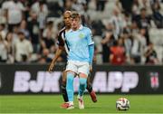 14 August 2025; Chris Forrester of St Patrick's Athletic in action against João Mário of Besiktas during the UEFA Conference League Third Qualifying Round second leg match between Besiktas and St Patrick's Athletic at Besiktas Stadium in Istanbul, Türkiye. Photo by Emre Oktay/Sportsfile