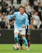 14 August 2025; Chris Forrester of St Patrick's Athletic in action against João Mário of Besiktas during the UEFA Conference League Third Qualifying Round second leg match between Besiktas and St Patrick's Athletic at Besiktas Stadium in Istanbul, Türkiye. Photo by Emre Oktay/Sportsfile