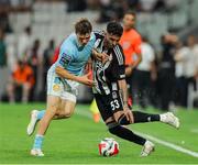 14 August 2025; Emirhan Topçu of Besiktas in action against Axel Sjöberg of St Patrick's Athletic during the UEFA Conference League Third Qualifying Round second leg match between Besiktas and St Patrick's Athletic at Besiktas Stadium in Istanbul, Türkiye. Photo by Emre Oktay/Sportsfile