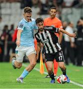 14 August 2025; Kartal Yilmaz of Besiktas in action against Mason Melia of St Patrick's Athletic during the UEFA Conference League Third Qualifying Round second leg match between Besiktas and St Patrick's Athletic at Besiktas Stadium in Istanbul, Türkiye. Photo by Emre Oktay/Sportsfile