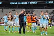 14 August 2025; St Patrick's Athletic manager Stephen Kenny and his players applaud their supporters after the UEFA Conference League Third Qualifying Round second leg match between Besiktas and St Patrick's Athletic at Besiktas Stadium in Istanbul, Türkiye. Photo by Emre Oktay/Sportsfile