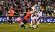 14 August 2025; Rory Gaffney of Shamrock Rovers shoots to score his side's second goal despite the efforts of Gentrit Halili of Ballkani during the UEFA Conference League Third Qualifying Round second leg match between Shamrock Rovers and Ballkani at Tallaght Stadium in Dublin. Photo by Stephen McCarthy/Sportsfile