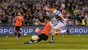 14 August 2025; Rory Gaffney of Shamrock Rovers shoots to score his side's second goal despite the efforts of Gentrit Halili of Ballkani during the UEFA Conference League Third Qualifying Round second leg match between Shamrock Rovers and Ballkani at Tallaght Stadium in Dublin. Photo by Stephen McCarthy/Sportsfile