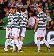 14 August 2025; Graham Burke of Shamrock Rovers, left, celebrates with team-mates, from left, Connor Malley, Matt Healy and Daniel Cleary after scoring their side's fourth goal during the UEFA Conference League Third Qualifying Round second leg match between Shamrock Rovers and Ballkani at Tallaght Stadium in Dublin. Photo by Stephen McCarthy/Sportsfile
