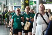 14 August 2025; Neve Jones, left, and Niamh O'Dowd at Dublin Airport ahead of the Ireland Women Rugby team's departure to the UK for the 2025 Women's Rugby World Cup. Photo by Shauna Clinton/Sportsfile