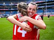 3 August 2025; Louth players Eimear Murray and Kate Flood, 14, celebrate after their side's victory in the TG4 All-Ireland Ladies Football Junior Championship final match between Antrim and Louth at Croke Park in Dublin. Photo by Piaras Ó Mídheach/Sportsfile