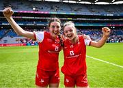 3 August 2025; Louth players Maggie Holland, left, and Aoife Russell celebrate after the TG4 All-Ireland Ladies Football Junior Championship final match between Antrim and Louth at Croke Park in Dublin. Photo by Piaras Ó Mídheach/Sportsfile