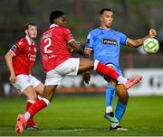 15 August 2025; Douglas James Taylor of Bohemians is tackled by Edwin Agbaje of Sligo Rovers during the Sports Direct Men’s FAI Cup third round match between Bohemians and Sligo Rovers at Dalymount Park in Dublin. Photo by Stephen McCarthy/Sportsfile