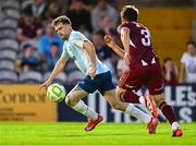 15 August 2025; Matthew Barrett of Salthill Devon in action against Regan Donelon of Galway United during the Sports Direct Men’s FAI Cup third round match between Salthill Devon and Galway United at Eamonn Deacy Park in Galway. Photo by Piaras Ó Mídheach/Sportsfile