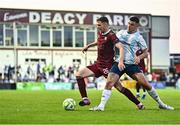 15 August 2025; Garry Buckley of Galway United in action against Enda Curran of Salthill Devon reacts during the Sports Direct Men’s FAI Cup third round match between Salthill Devon and Galway United at Eamonn Deacy Park in Galway. Photo by Piaras Ó Mídheach/Sportsfile