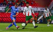 15 August 2025; Conan Noonan of Waterford shoots on goal head of Freddie Anderson of Cork City during the Sports Direct Men’s FAI Cup third round match between Cork City and Waterford at Turner's Cross in Cork. Photo by Tyler Miller/Sportsfile