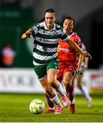 15 August 2025; Melissa O'Kane of Shamrock Rovers in action against Megan Smyth-Lynch of Shelbourne during the Sports Direct Women's FAI Cup quarter-final match between Shelbourne and Shamrock Rovers at Tolka Park in Dublin. Photo by Ben McShane/Sportsfile