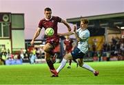 15 August 2025; Garry Buckley of Galway United in action against Alexander van Strien Murphy of Salthill Devon during the Sports Direct Men’s FAI Cup third round match between Salthill Devon and Galway United at Eamonn Deacy Park in Galway. Photo by Piaras Ó Mídheach/Sportsfile
