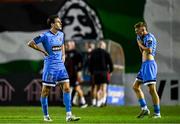 15 August 2025; Bohemians players Liam Smith, left, and Rhys Brennan after their side's defeat in the Sports Direct Men’s FAI Cup third round match between Bohemians and Sligo Rovers at Dalymount Park in Dublin. Photo by Seb Daly/Sportsfile