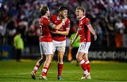 15 August 2025; Sligo Rovers players, from left, Will Fitzgerald, Seb Quirk and Daire Patton celebrate after their side's victory in the Sports Direct Men’s FAI Cup third round match between Bohemians and Sligo Rovers at Dalymount Park in Dublin. Photo by Seb Daly/Sportsfile