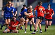 16 August 2025; Erin McFadden of Leinster in action against Lisa O'Mahony, left, and Abi Kelly of Munster during the PwC U-18 Girls Interprovincial Series match between Leinster and Munster at Energia Park in Dublin. Photo by Shauna Clinton/Sportsfile