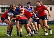 16 August 2025; Orlagh O'Brien of Leinster is tackled by Julie Finn of Munster during the PwC U-18 Girls Interprovincial Series match between Leinster and Munster at Energia Park in Dublin. Photo by Shauna Clinton/Sportsfile