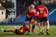 16 August 2025; Lilly Murphy of Leinster in action against Aoife Martin, left, and Lisa O'Mahony of Munster during the PwC U-18 Girls Interprovincial Series match between Leinster and Munster at Energia Park in Dublin. Photo by Shauna Clinton/Sportsfile