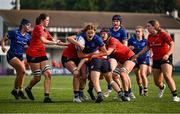 16 August 2025; Orlagh O'Brien of Leinster is tackled by Julie Finn of Munster during the PwC U-18 Girls Interprovincial Series match between Leinster and Munster at Energia Park in Dublin. Photo by Shauna Clinton/Sportsfile