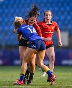 16 August 2025; Niamh O'Mahony of Munster is tackled by Lillie Harney of Leinster during the PwC U-18 Girls Interprovincial Series match between Leinster and Munster at Energia Park in Dublin. Photo by Shauna Clinton/Sportsfile