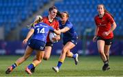 16 August 2025; Niamh O'Mahony of Munster is tackled by Lillie Harney, left, and Gráinne Cleary of Leinster during the PwC U-18 Girls Interprovincial Series match between Leinster and Munster at Energia Park in Dublin. Photo by Shauna Clinton/Sportsfile