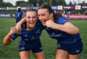 16 August 2025; Leinster players Lillie Harney, left, and Gráinne Cleary celebrate after their side's victory in the PwC U-18 Girls Interprovincial Series match between Leinster and Munster at Energia Park in Dublin. Photo by Shauna Clinton/Sportsfile