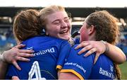 16 August 2025; Lilly Murphy of Leinster, centre, celebrates with team-mates Orlagh O'Brien, left, and Molly Hennessy Murphy after her side's victory in the PwC U-18 Girls Interprovincial Series match between Leinster and Munster at Energia Park in Dublin. Photo by Shauna Clinton/Sportsfile