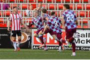 16 August 2025; Drogheda United players, from left, Josh Thomas, Andrew Quinn and Conor Kane celebrate after Andrew Quinn scored their first goal during the Sports Direct Men’s FAI Cup third round match between Derry City and Drogheda United at The Ryan McBride Brandywell Stadium in Derry. Photo by Stephen McCarthy/Sportsfile