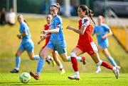 16 August 2025; Isabella Marie Flocchini of Treaty United in action against Eve Conheady of DLR Waves during the Sports Direct Women's FAI Cup quarter-final match between DLR Waves and Treaty United at UCD Bowl in Dublin. Photo by Seb Daly/Sportsfile