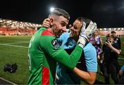 16 August 2025; Drogheda United goalkeeper Luke Dennison celebrates with assistant manager Daire Doyle after the Sports Direct Men’s FAI Cup third round match between Derry City and Drogheda United at The Ryan McBride Brandywell Stadium in Derry. Photo by Stephen McCarthy/Sportsfile