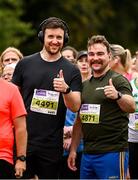 16 August 2025; Mark Gibbons, from Roscommon, left, and Johnny Flynn, from Clontarf Astro Pitch, during the Irish Life Dublin Race Series Frank Duffy 10 Mile in Phoenix Park, Dublin. Photo by Seb Daly/Sportsfile