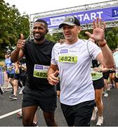 16 August 2025; Ahmed, Dafalla, from Dublin, left, and Ricardas Didzbalis, from Kildare, during the Irish Life Dublin Race Series Frank Duffy 10 Mile in Phoenix Park, Dublin. Photo by Seb Daly/Sportsfile