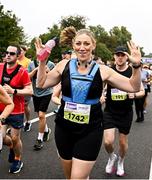16 August 2025; Niamh Davis, from Dublin, during the Irish Life Dublin Race Series Frank Duffy 10 Mile in Phoenix Park, Dublin. Photo by Seb Daly/Sportsfile