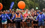 16 August 2025; Course stewards during the Irish Life Dublin Race Series Frank Duffy 10 Mile in Phoenix Park, Dublin. Photo by Seb Daly/Sportsfile