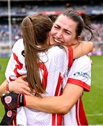 3 August 2025; Tyrone players Eimear Quinn, right, and Cara McCoubrey celebrate after the TG4 All-Ireland Ladies Football Intermediate Championship final match between Laois and Tyrone at Croke Park in Dublin. Photo by Piaras Ó Mídheach/Sportsfile