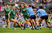 3 August 2025; Emma Duggan of Meath in action against Dublin players, from left, Martha Byrne, Niamh Donlon and Leah Caffrey during the TG4 All-Ireland Ladies Football Senior Championship final match between Dublin and Meath at Croke Park in Dublin. Photo by Piaras Ó Mídheach/Sportsfile