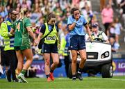 3 August 2025; Hannah Tyrrell of Dublin leaves the pitch to receive medical attention for an injury during the TG4 All-Ireland Ladies Football Senior Championship final match between Dublin and Meath at Croke Park in Dublin. Photo by Piaras Ó Mídheach/Sportsfile