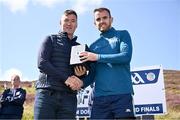 4 August 2025; GAA National Head of Hurling Willie Maher, left, makes a presentation to Noel Fallon of Roscommon after the M. Donnelly GAA Poc Fada All-Ireland Finals at Annaverna Mountain in the Cooley Peninsula, Ravensdale, Louth. Photo by Piaras Ó Mídheach/Sportsfile