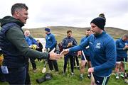 4 August 2025; GAA National Head of Hurling Willie Maher presents a sliotar to Cathal Dillon of Tipperary before the M. Donnelly GAA Poc Fada All-Ireland Finals at Annaverna Mountain in the Cooley Peninsula, Ravensdale, Louth. Photo by Piaras Ó Mídheach/Sportsfile
