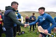4 August 2025; GAA National Head of Hurling Willie Maher presents a sliotar to Pearce Smyth of Down before the M. Donnelly GAA Poc Fada All-Ireland Finals at Annaverna Mountain in the Cooley Peninsula, Ravensdale, Louth. Photo by Piaras Ó Mídheach/Sportsfile