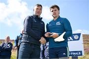 4 August 2025; GAA National Head of Hurling Willie Maher, left, makes a presentation to Cillian Kiely of Offaly after the M. Donnelly GAA Poc Fada All-Ireland Finals at Annaverna Mountain in the Cooley Peninsula, Ravensdale, Louth. Photo by Piaras Ó Mídheach/Sportsfile